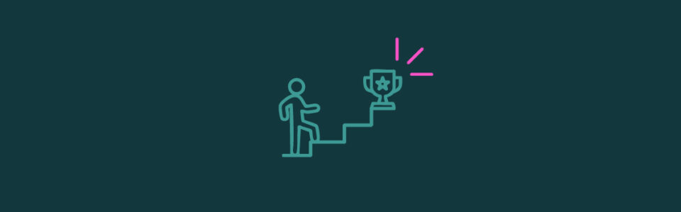 An icon of a person hiking up steps to a trophy with pink emphasis lines on the top right