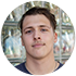 Alltru member Matthew, a young white man with wavy brunette hair