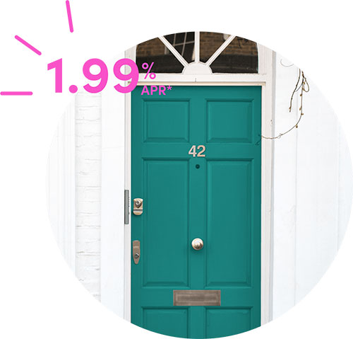 Image of a teal colored door on a house with the text '1.99% APR*' to the top-left hand side. Image is inside of a circle shape.