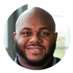 Alltru member Sean, a young African-American man with a bald head