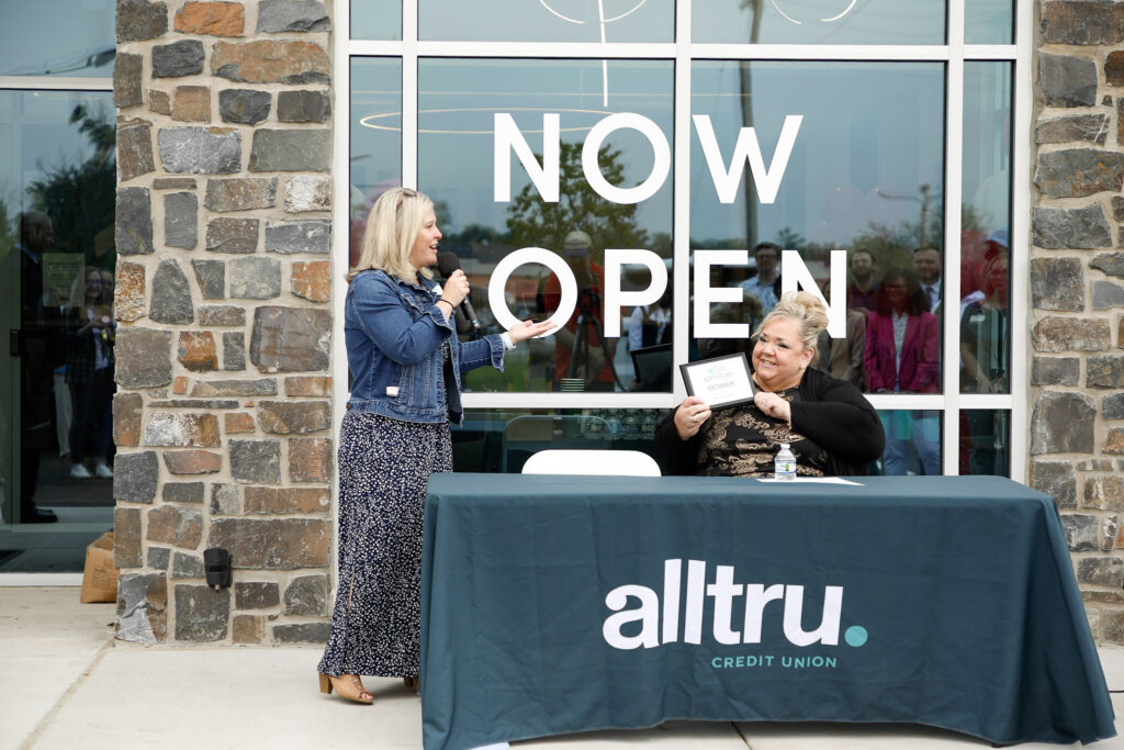 Alltru CEO Michelle being presented with a plaque from the North County Chamber of Commerce