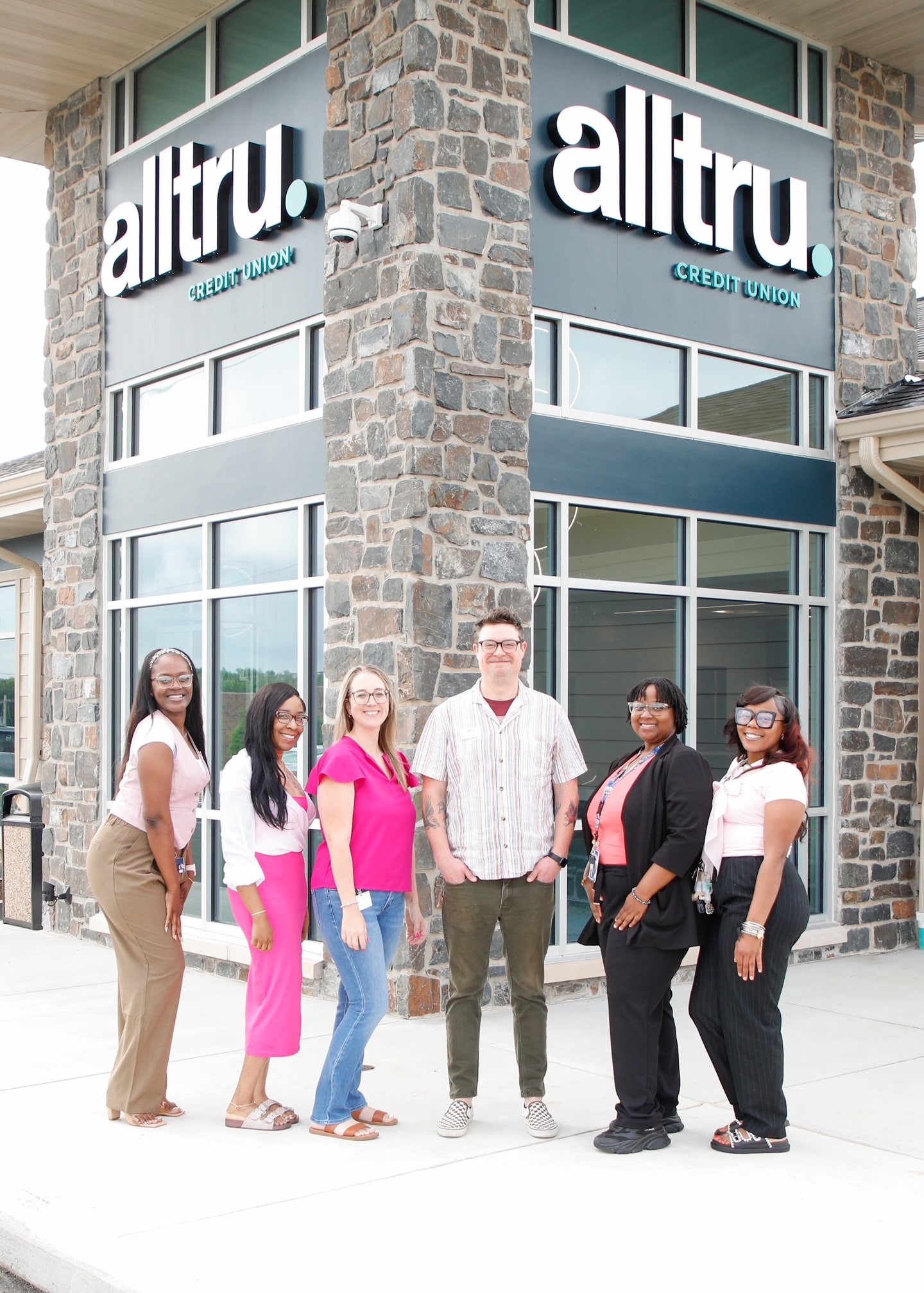 Alltru Credit Union’s Florissant branch team outside the new location near Cross Keys