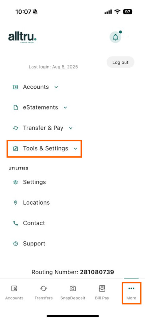 Mobile banking screenshot of the More tab with Tools & Settings and More in orange boxes