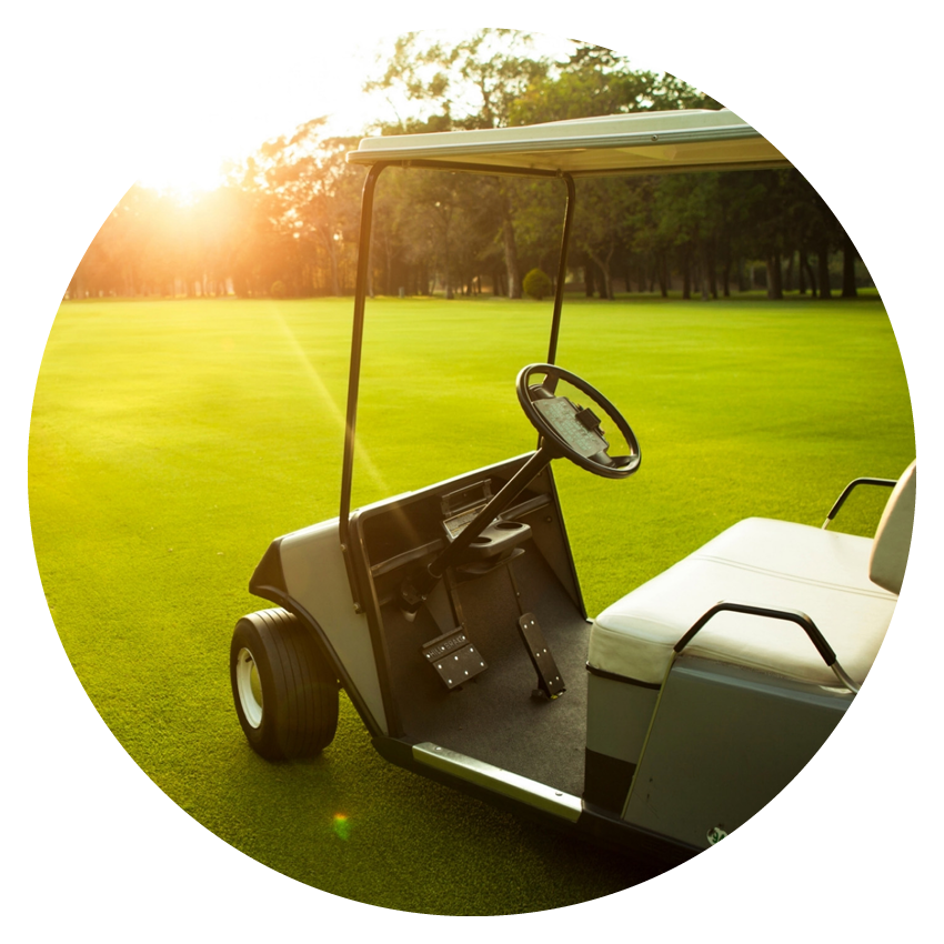 RV / Boat / Motorcycle Loans | Alltru Credit Union | St. Louis, MO a photo of a golf cart facing the sunset on a golf course