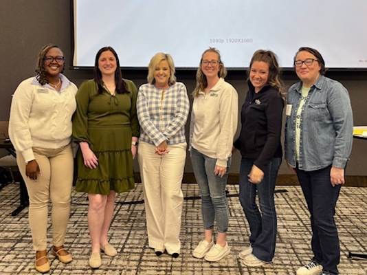 Alltru Credit Union employees Aumbrey Evans, Emily Howes, Lending Solutions Consulting’s Lorrie Wohlfeil, Breanna Fornachon, Amanda Thornton, and Sandi Totterer, attending the University of Lending training in St. Louis.